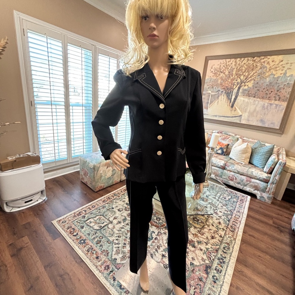 Gorgeous suit in impeccable condition.